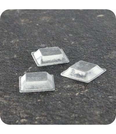 Lipnūs silikono kalneliai "Bumpons" 10 x 10 x 2,5mm, savilipiai, skaidrūs, trapecijos formos (350vnt.)